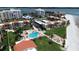 Aerial view of community with pool and beach access at 851 Bayway Blvd # 205, Clearwater Beach, FL 33767