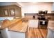Modern kitchen with granite countertops and stainless steel appliances at 36750 Us 19 # 2052, Palm Harbor, FL 34684
