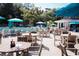Enjoy casual dining with tables and chairs by the pool at 36750 Us 19 # 2052, Palm Harbor, FL 34684