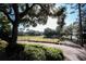 Scenic golf course view with lush green fairways and mature trees at 36750 Us 19 # 2052, Palm Harbor, FL 34684