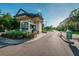 Community guard house entrance in a landscaped setting at 36750 Us 19 # 2052, Palm Harbor, FL 34684
