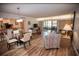 Open living and dining area with wood-look floors at 36750 Us 19 # 2052, Palm Harbor, FL 34684
