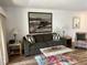 Spacious living room with hardwood floors, a large sofa, and stylish decor at 36750 Us 19 # 2052, Palm Harbor, FL 34684