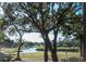 Serene golf course view with water feature and lush landscaping at 36750 Us 19 # 2052, Palm Harbor, FL 34684