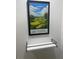 Framed Baltusrol golf course artwork hangs above a white shelf at 36750 Us 19 # 2052, Palm Harbor, FL 34684