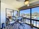 Enjoy outdoor dining on the screened lanai with views of the water and marina at 1801 Mariner Dr # 20, Tarpon Springs, FL 34689
