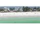 Aerial view of beach and building at 403 Gulf Way # 304, St Pete Beach, FL 33706