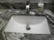 Bathroom featuring a modern sink and granite countertop at 1857 Bough Ave # C, Clearwater, FL 33760