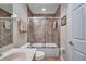 Clean bathroom with shower/tub combo and tile flooring at 7296 Marathon Dr # 504, Seminole, FL 33777