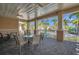 Relaxing covered patio with outdoor seating and pool views at 7296 Marathon Dr # 504, Seminole, FL 33777