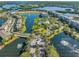 Resort-style community featuring a waterfront location and lush landscaping at 7296 Marathon Dr # 504, Seminole, FL 33777