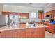 Well-equipped community kitchen with stainless steel appliances at 7296 Marathon Dr # 504, Seminole, FL 33777