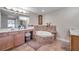 Bathroom with double vanity, jetted tub, and shower at 7296 Marathon Dr # 504, Seminole, FL 33777