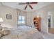 Serene bedroom with a comfortable bed and plenty of natural light at 7296 Marathon Dr # 504, Seminole, FL 33777