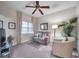 Comfortable guest room with seating area, large window, and neutral decor at 7296 Marathon Dr # 504, Seminole, FL 33777