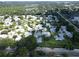 Community aerial view, showcasing mature trees and landscaping, single story homes, serene neighborhood setting at 3357 38Th S St # A, St Petersburg, FL 33711