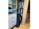 Closet featuring hanging clothes, folded items, and built-in drawers and shelving at 3357 38Th S St # A, St Petersburg, FL 33711