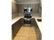 Modern kitchen featuring stainless steel appliances, stylish cabinets, and sleek countertops at 3357 38Th S St # A, St Petersburg, FL 33711