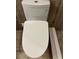 Close-up of a modern toilet with a sleek design in a well-lit bathroom at 3357 38Th S St # A, St Petersburg, FL 33711