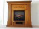 Electric fireplace with a wood-look surround at 101 Lake Ne Ave # 222, Largo, FL 33771