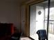 Living room with sliding door to balcony at 101 Lake Ne Ave # 222, Largo, FL 33771