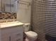 Clean bathroom with shower/tub combo, vanity, and updated tile at 101 Lake Ne Ave # 222, Largo, FL 33771