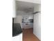 Kitchen with granite countertops and white cabinets at 101 Lake Ne Ave # 222, Largo, FL 33771