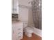 Bathroom with white vanity and shower/tub combo at 101 Lake Ne Ave # 222, Largo, FL 33771