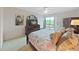 Bedroom with king-size bed and access to patio at 203 Mariner Dr # 203, Tarpon Springs, FL 34689