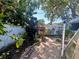 Brick paved backyard with lush landscaping at 1538 Lake S Ave, Clearwater, FL 33756