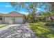 Charming two-story home with a well-manicured lawn and a double garage at 842 Amelia Ne Ct, St Petersburg, FL 33702