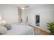 Main bedroom with sliding door to the patio and hardwood floors at 842 Amelia Ne Ct, St Petersburg, FL 33702