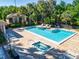 Inviting community pool and spa area with ample lounge space at 842 Amelia Ne Ct, St Petersburg, FL 33702