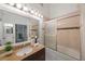 Updated bathroom with tub shower combo and stylish fixtures at 842 Amelia Ne Ct, St Petersburg, FL 33702