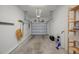 Clean and spacious garage with ample storage shelving and overhead storage at 842 Amelia Ne Ct, St Petersburg, FL 33702