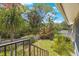 Private backyard oasis with lush landscaping and a wooden fence at 842 Amelia Ne Ct, St Petersburg, FL 33702