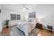 Main bedroom with plush carpeting, large windows and ensuite bathroom at 842 Amelia Ne Ct, St Petersburg, FL 33702
