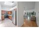 Open kitchen with stainless steel appliances and view to living area at 842 Amelia Ne Ct, St Petersburg, FL 33702