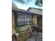 Small front yard with seating area and plants at 3447 Monte Rio St, New Port Richey, FL 34655