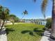 Expansive backyard offers privacy and scenic waterfront views at 240 N Julia Cir, St Pete Beach, FL 33706