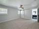 Bedroom with ensuite bathroom, carpet, ceiling fan and modern finishes at 240 N Julia Cir, St Pete Beach, FL 33706