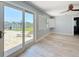 Bedroom featuring neutral tones, patio access and a view of the water at 240 N Julia Cir, St Pete Beach, FL 33706