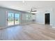 Bedroom featuring neutral tones, patio access and a view of the water at 240 N Julia Cir, St Pete Beach, FL 33706