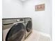 Updated laundry room with side by side Samsung washer and dryer set at 240 N Julia Cir, St Pete Beach, FL 33706