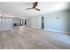 Spacious open floor plan with hardwood floors and recessed lighting at 240 N Julia Cir, St Pete Beach, FL 33706