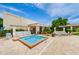 Relaxing community spa with seating and patio area at 5969 Terrace Park N Dr # 304, St Petersburg, FL 33709