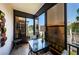 Spacious screened lanai with table and chairs at 5969 Terrace Park N Dr # 304, St Petersburg, FL 33709