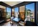 Screened lanai with outdoor seating and view at 5969 Terrace Park N Dr # 304, St Petersburg, FL 33709