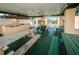 Community outdoor kitchen with picnic tables and grills at 5969 Terrace Park N Dr # 304, St Petersburg, FL 33709