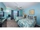 Guest bedroom with twin beds and a workspace at 5969 Terrace Park N Dr # 304, St Petersburg, FL 33709